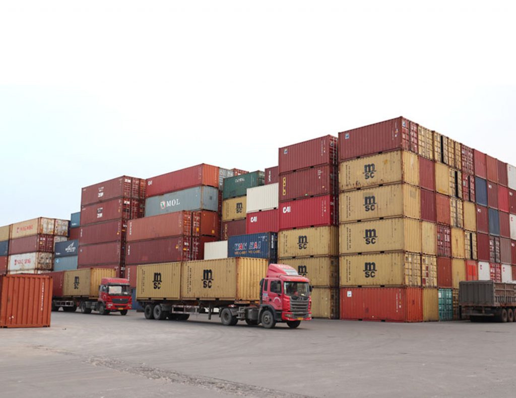 Container yard with trucks
